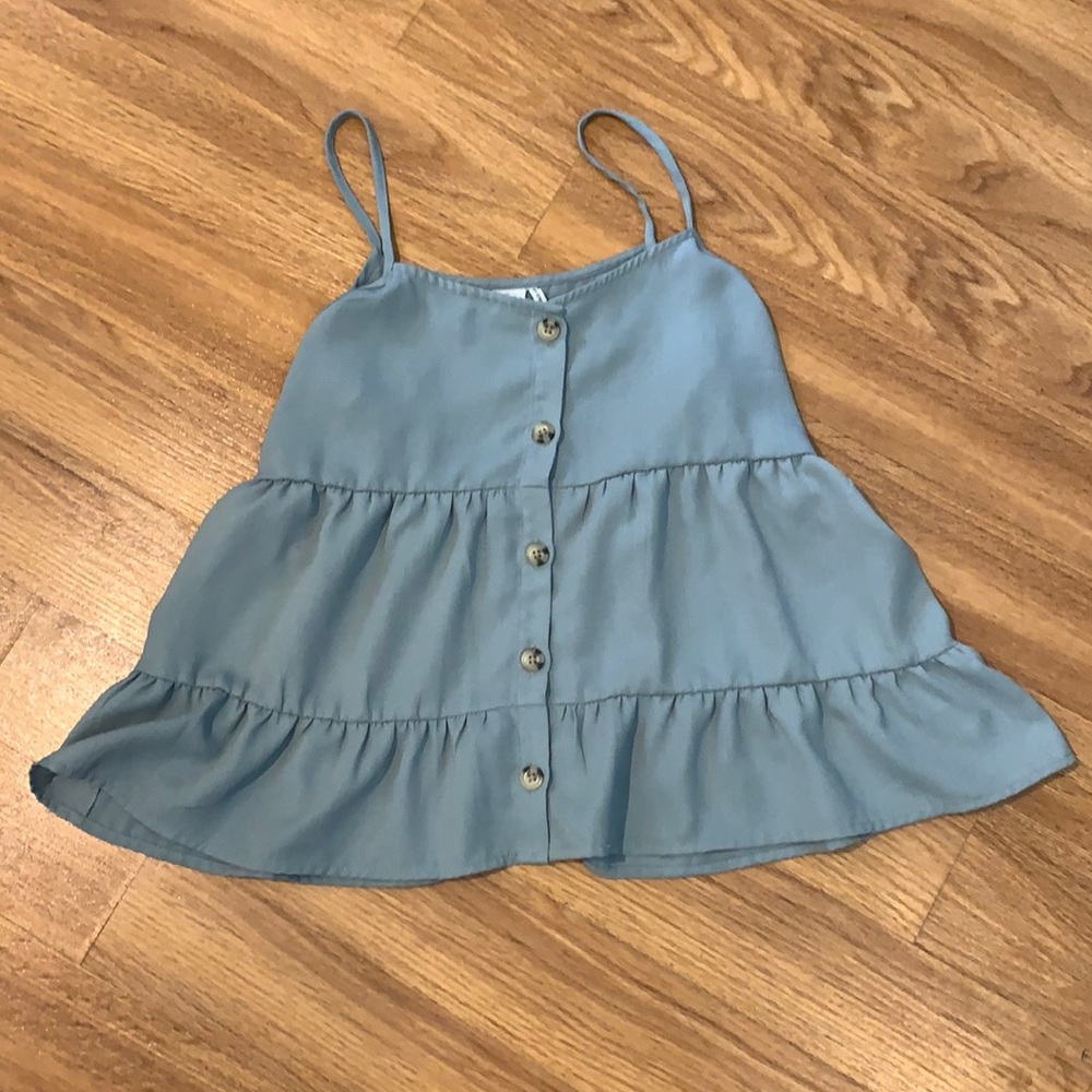 Women’s size S button tank.